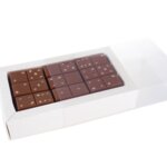 Krabička s 18ks čokoládových mliečnych DOMINO kociek