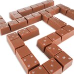 Krabička s 18ks čokoládových mliečnych DOMINO kociek